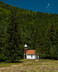 White chapel in the mountains