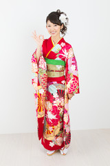 	Beautiful asian kimono woman on white background