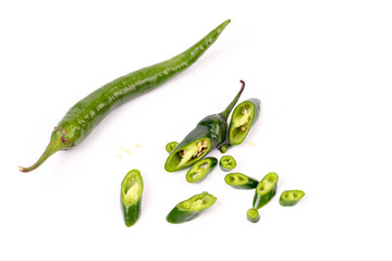 Green chilli pepper and slices.