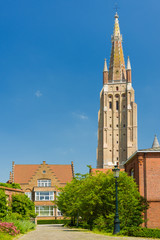 Fototapeta na wymiar Our Lady Church in Bruges in a summer day