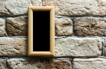 photo frame on brick wall
