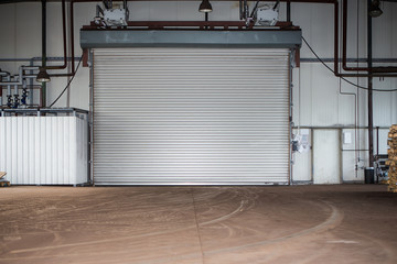 Building with roller shutter door