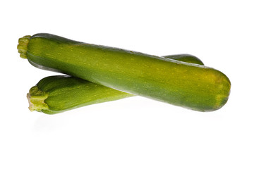 zucchinis or courgettes isolated on a white background.