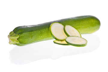 Sliced zucchini or courgette isolated on a white background..