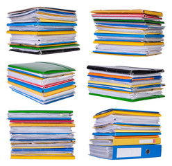 Stacks of papers and documents isolated on white