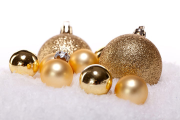festliche weihnachtsdekoration in gold schnee glänzend isoliert