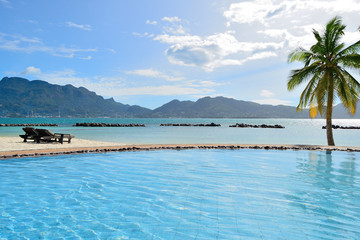 Tropical beach and pool. Travel destination.