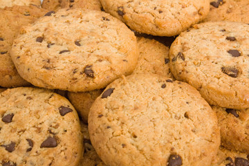Background of a pile of chocolate chip cookies