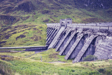Hydro power dam in mountain landscape