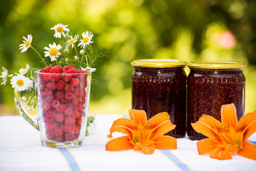 Obraz na płótnie Canvas Raspberry jam and fresh berries
