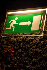 Lighted emergency exit sign.
