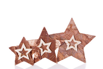 wooden stars christmas decoration on white background