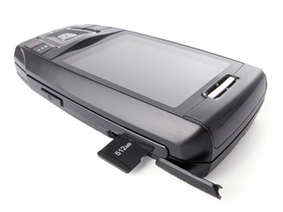 Micro SD card half inserted into the mobile phone port