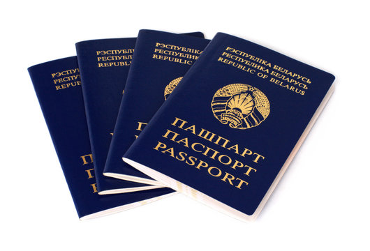 four belarusian passports on a white background