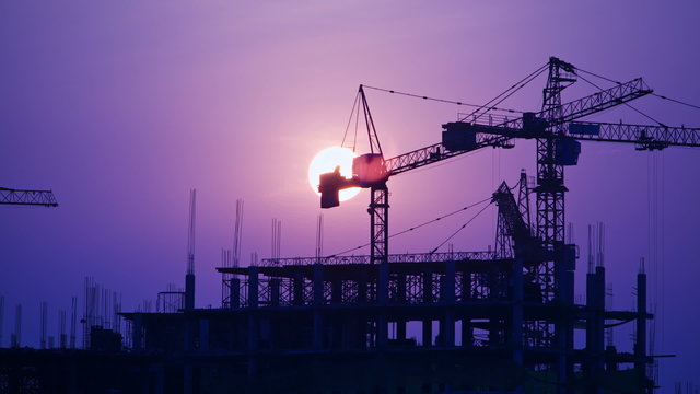 Construction site at sunset, time lapse