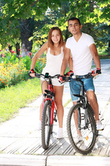Obraz premium couple with their bikes