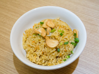 a bowl of garlic fried rice