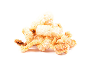 Fried pork rinds over a white background