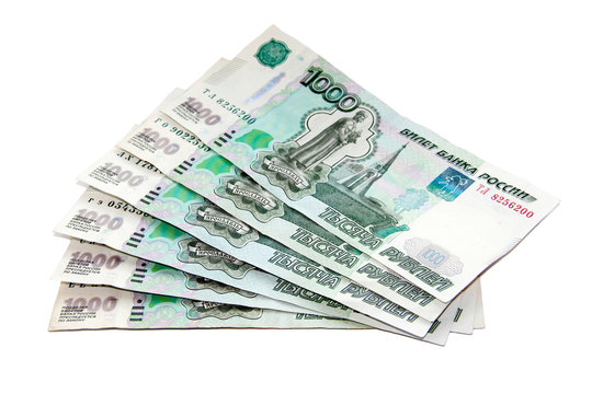 Russian rubles (banknotes 1000) on a white background