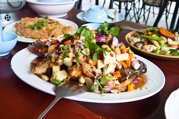 Thai dressed salad, mix of lemongrass and spice, close up