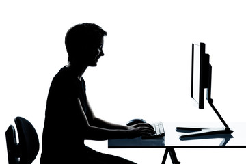 one young teenager boy or girl silhouette computer computing typ