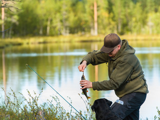 Fisherman and perch