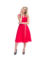 Thoughtful woman standing