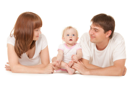 Happy family lying on the white background