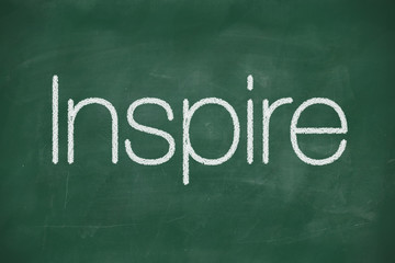 Obraz premium Inspire handwritten on blackboard