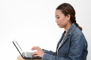 Teenage Girl Using Laptop