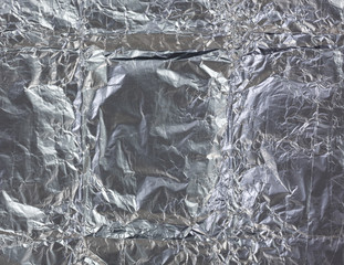 A very close view of  crinkled used tin foil