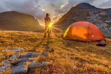 Obraz premium Sunrise with Tent in Lapland