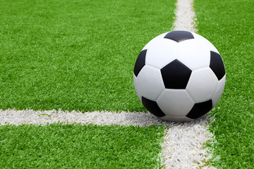 Fototapeta premium Soccer ball point on field at side line