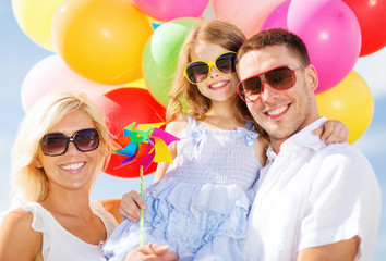 family with colorful balloons