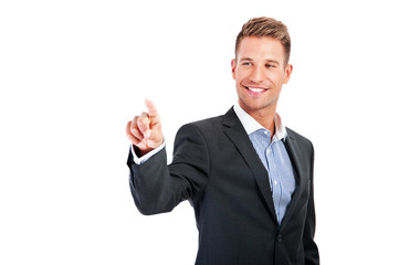 Businessman pressing an imaginary button on bokeh