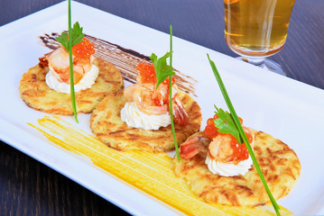 pancakes with shrimps and caviar