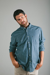 Attractive young man with plaid shirt.