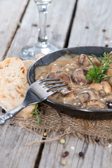 Pan with Mushrooms in Sauce