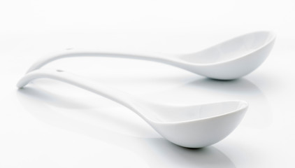 white porcelain scoop on white base