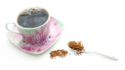 Porcelain cup with instant coffee