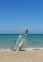Glass bottle with 10 dollars, money
