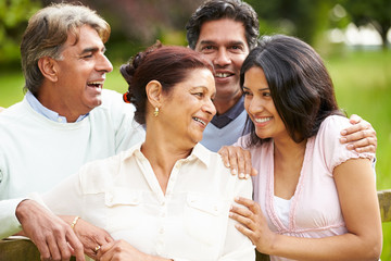 Indian Family Walking In Countryside