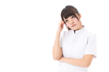 young asian nurse thinking on white background