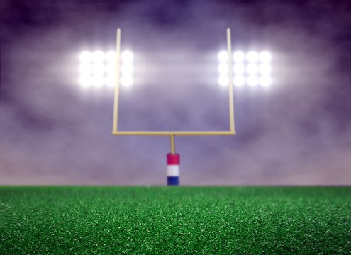 Empty Football Field and Spotlight with Smoke