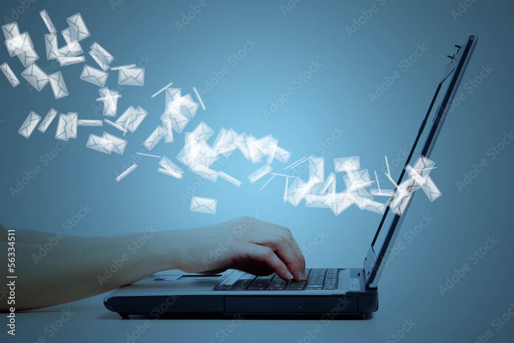Fototapete Hands with laptop computer keyboard.