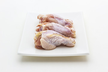 Raw chicken drumsticks