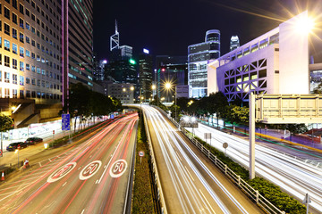 Fototapeta na wymiar Busy traffic on highway at night