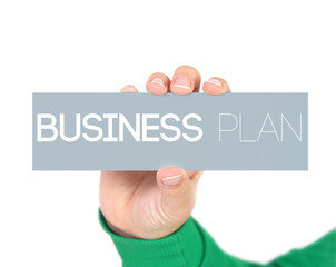woman holding a label with business plan