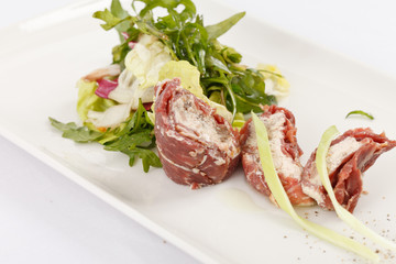 meat rolls with salad