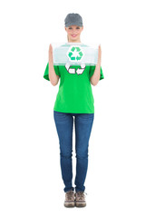 Fototapeta premium Happy pretty environmental activist holding a recycling box